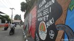 Mural Perdagangan Monyet Mejeng di Yogyakarta