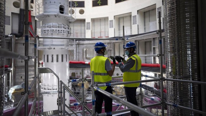 A part of the cryostat component of the ITER machine is pictured in Saint-Paul-Lez-Durance, France, Thursday, Sept. 9, 2021. Scientists at the International Thermonuclear Experimental Reactor in southern France took delivery of the first part of a massive magnet so strong its American manufacturer claims it can lift an aircraft carrier. (AP Photo/Daniel Cole)