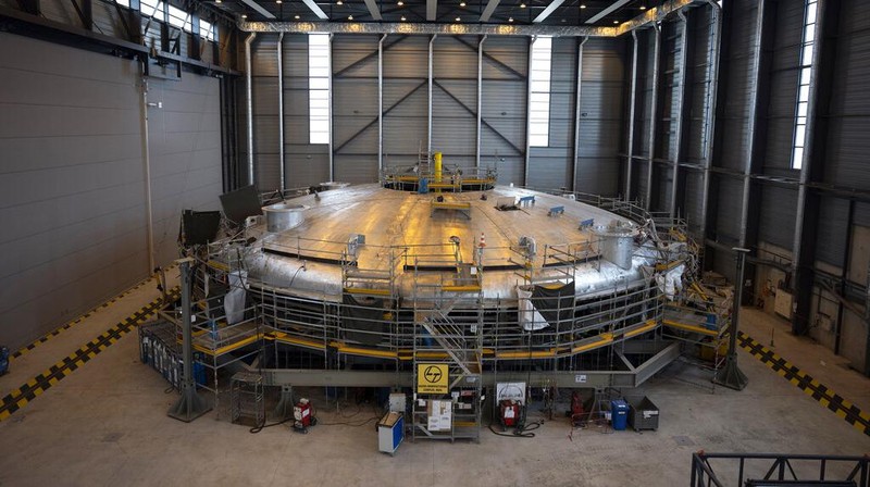 A part of the cryostat component of the ITER machine is pictured in Saint-Paul-Lez-Durance, France, Thursday, Sept. 9, 2021. Scientists at the International Thermonuclear Experimental Reactor in southern France took delivery of the first part of a massive magnet so strong its American manufacturer claims it can lift an aircraft carrier. (AP Photo/Daniel Cole)
