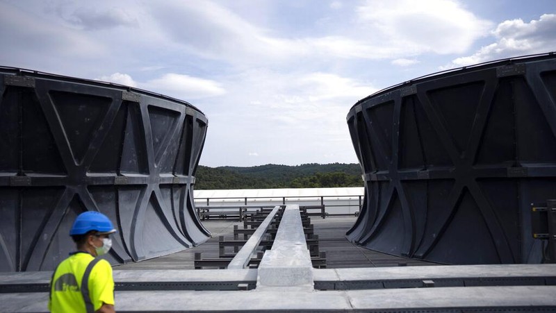 A part of the cryostat component of the ITER machine is pictured in Saint-Paul-Lez-Durance, France, Thursday, Sept. 9, 2021. Scientists at the International Thermonuclear Experimental Reactor in southern France took delivery of the first part of a massive magnet so strong its American manufacturer claims it can lift an aircraft carrier. (AP Photo/Daniel Cole)