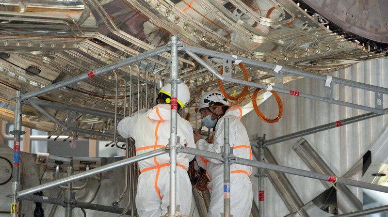 A part of the cryostat component of the ITER machine is pictured in Saint-Paul-Lez-Durance, France, Thursday, Sept. 9, 2021. Scientists at the International Thermonuclear Experimental Reactor in southern France took delivery of the first part of a massive magnet so strong its American manufacturer claims it can lift an aircraft carrier. (AP Photo/Daniel Cole)