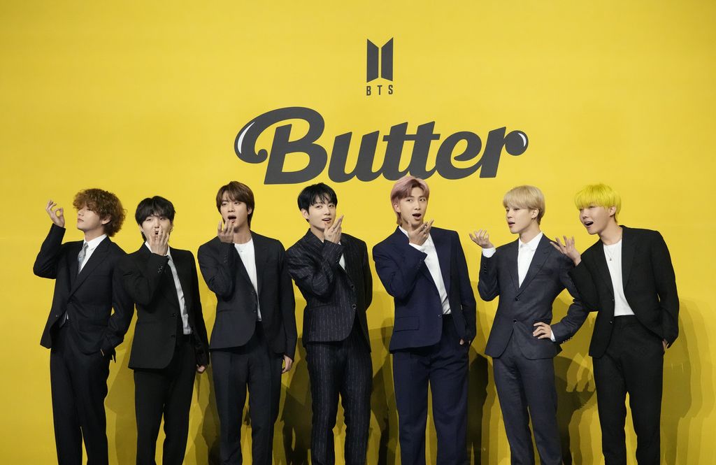 FILE - In this May 21, 2021, file photo members of South Korean K-pop band BTS pose for photographers ahead of a press conference to introduce their new single 