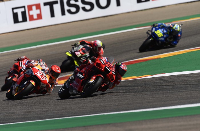 Motogp Aragon Francesco Bagnaia of Italy, (63), on his Ducati leans into a corner ahead of Marc Marquez of Spain, (93), on his Honda, during the Alcaniz Aragon Moto GP race at the MotorLand Aragon circuit, in Alcaniz, Spain Sunday, Sept. 12, 2021. (AP Photo/Jose Breton)