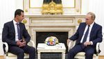 Kehangatan Al-Assad dan Putin dalam Pertemuan Mendadak di Moskow