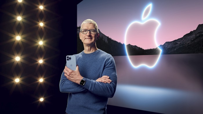 Apple CEO Tim Cook holds the iPhone 13 Pro Max and Apple Watch Series 7 during a special event at Apple Park in Cupertino, California broadcast September 14, 2021.  Apple Inc/Handout via REUTERS   NO RESALES. NO ARCHIVES. THIS IMAGE HAS BEEN SUPPLIED BY A THIRD PARTY.