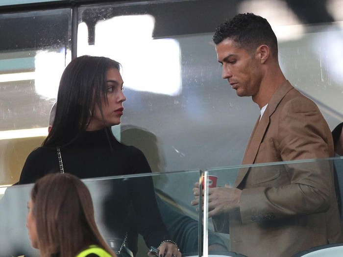 TURIN, ITALY - OCTOBER 02:  Cristiano Ronaldo and Georgina Rodriguez are seen during the Group H match of the UEFA Champions League between Juventus and BSC Young Boys at Allianz Stadium on October 2, 2018 in Turin, Italy.  (Photo by Emilio Andreoli/Getty Images)
