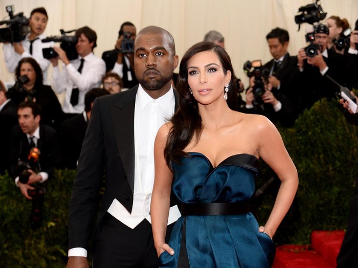 NEW YORK, NY - MAY 05:  Kanye West (L) and Kim Kardashian attend the Charles James: Beyond Fashion Costume Institute Gala at the Metropolitan Museum of Art on May 5, 2014 in New York City.  (Photo by Dimitrios Kambouris/Getty Images)