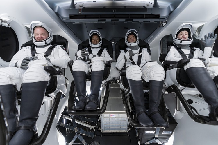 Private Spaceflight Explainer In this Aug. 8, 2021 photo provided by John Kraus, from left, Chris Sembroski, Sian Proctor, Jared Isaacman and Hayley Arceneaux stand for a photo in Bozeman, Mont., during a