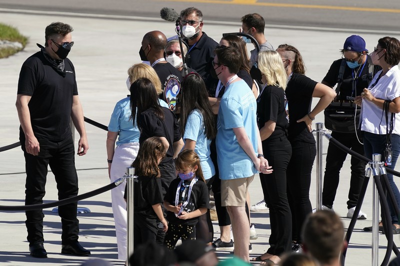 In this Aug. 8, 2021 photo provided by John Kraus, from left, Chris Sembroski, Sian Proctor, Jared Isaacman and Hayley Arceneaux stand for a photo in Bozeman, Mont., during a 