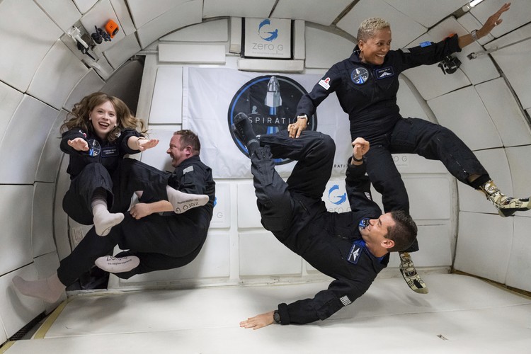 Private Spaceflight Explainer In this Aug. 8, 2021 photo provided by John Kraus, from left, Chris Sembroski, Sian Proctor, Jared Isaacman and Hayley Arceneaux stand for a photo in Bozeman, Mont., during a