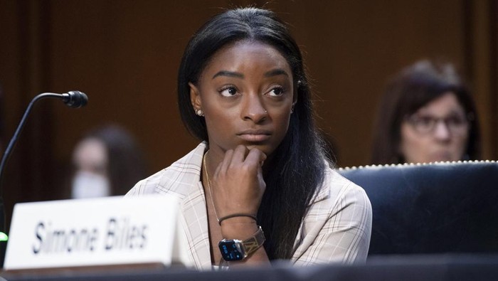 United States Olympic gymnast Simone Biles testifies during a Senate Judiciary hearing about the Inspector Generals report on the FBIs handling of the Larry Nassar investigation on Capitol Hill, Wednesday, Sept. 15, 2021, in Washington. Nassar was charged in 2016 with federal child pornography offenses and sexual abuse charges in Michigan. He is now serving decades in prison after hundreds of girls and women said he sexually abused them under the guise of medical treatment when he worked for Michigan State and Indiana-based USA Gymnastics, which trains Olympians. (Saul Loeb/Pool via AP)