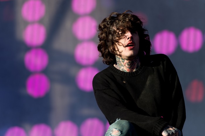 GLASTONBURY, ENGLAND - JUNE 24:  Oliver Sykes of Bring Me The Horizon performs on the Other Stage during the Glastonbury Festival at Worthy Farm, Pilton on June 24, 2016 in Glastonbury, England.  Now its 46th year the festival is one largest music festivals in the world and this year features headline acts Muse, Adele and Coldplay. The Festival, which Michael Eavis started in 1970 when several hundred hippies paid just Â£1, now attracts more than 175,000 people.  (Photo by Ian Gavan/Getty Images)
