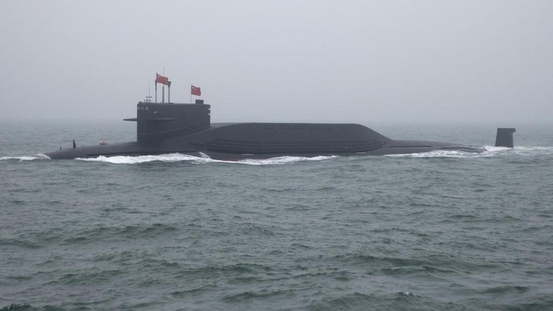 A type 094 Jin-class nuclear submarine Long March 15 of the Chinese People's Liberation Army (PLA) Navy participates in a naval parade to commemorate the 70th anniversary of the founding of China's PLA Navy in the sea near Qingdao, in eastern China's Shandong province on April 23, 2019. - China celebrated the 70th anniversary of its navy by showing off its growing fleet in a sea parade featuring a brand new guided-missile destroyer. (Photo by Mark Schiefelbein / POOL / AFP)