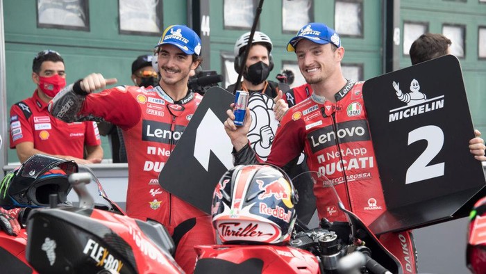 MISANO ADRIATICO, ITALY - SEPTEMBER 18: Jack Miller of Australia and Ducati Lenovo Team and Francesco Bagnaia of Italy and Ducati Lenovo Team (L) celebrate at the end of the MotoGP qualifying practice during the MotoGP Of San Marino - Qualifying at Misano World Circuit on September 18, 2021 in Misano Adriatico, Italy. (Photo by Mirco Lazzari gp/Getty Images)
