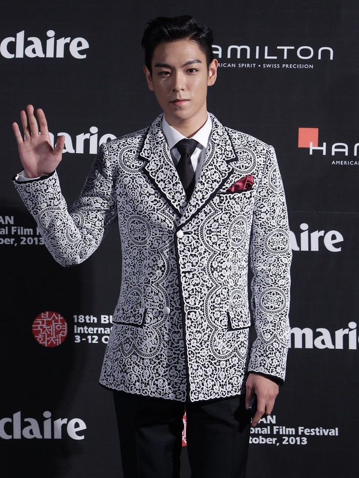 183156734 BUSAN, SOUTH KOREA - OCTOBER 05: Actor T.O.P of Bigbang arrives for the marie claire Asia Star Awards during the 18th Busan International Film Festival on October 5, 2013 in Busan, South Korea. (Photo by Chung Sung-Jun/Getty Images)