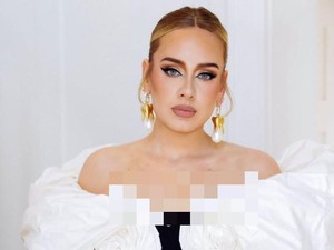 Nyeleneh! Adele Doyan Makan Keripik Kentang Pakai Kecap Inggris