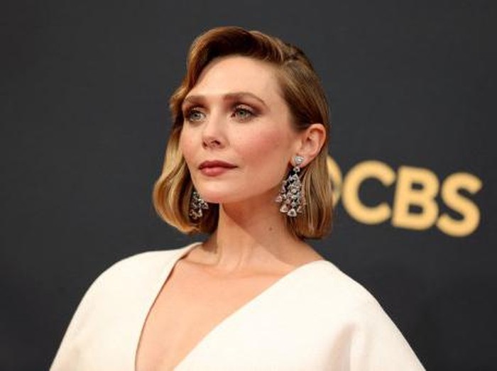LOS ANGELES, CALIFORNIA - SEPTEMBER 19: Elizabeth Olsen attends the 73rd Primetime Emmy Awards at L.A. LIVE on September 19, 2021 in Los Angeles, California.   Rich Fury/Getty Images/AFP (Photo by Rich Fury / GETTY IMAGES NORTH AMERICA / Getty Images via AFP)