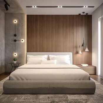 Urban jungle in bedroom with double bed, lamp and carpet, real photo with copy space on the wall