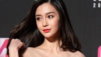 Padahal di agensi milik suaminya itu, Angelababy mendapatkan kontrak eksklusif. Foto: Getty Images