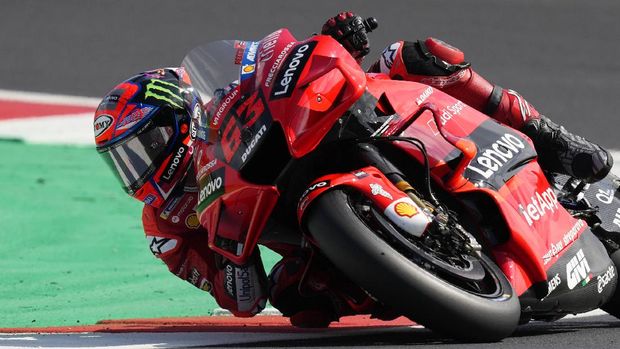 Italy's Francesco Bagnaia rides his Ducati during the MotoGP practice session for Sunday's San Marino Motorcycle Grand Prix at the Misano circuit in Misano Adriatico, Italy, Saturday, Sept. 18, 2021. (AP Photo/Antonio Calanni)