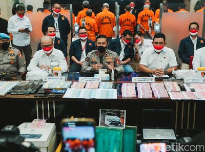 20 Tersangka Kasus Peredaran Uang Palsu Kini Berbaju Oranye