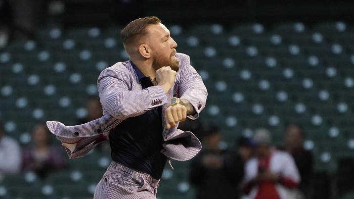MMA fighter Conor McGregor throws out a ceremonial first pitch before a baseball game between the Chicago Cubs and the Minnesota Twins Tuesday, Sept. 21, 2021, in Chicago. (AP Photo/Charles Rex Arbogast)