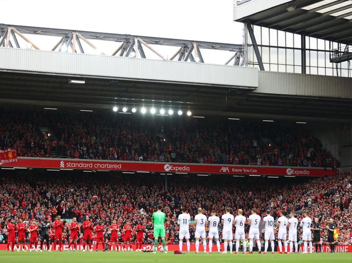 LIVERPOOL, ENGLAND - AUGUST 21: A general view inside the stadium as players and sides take part in a minutes applause in remembrance of Andrew Devine, the 97th victim of the Hillsborough Stadium disaster prior to the Premier League match between Liverpool and Burnley at Anfield on August 21, 2021 in Liverpool, England. (Photo by Catherine Ivill/Getty Images)