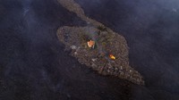 Ratusan rumah pun tampak terkepung lava dari gunung berapi ini. AP Photo/Alfonso Escalero
