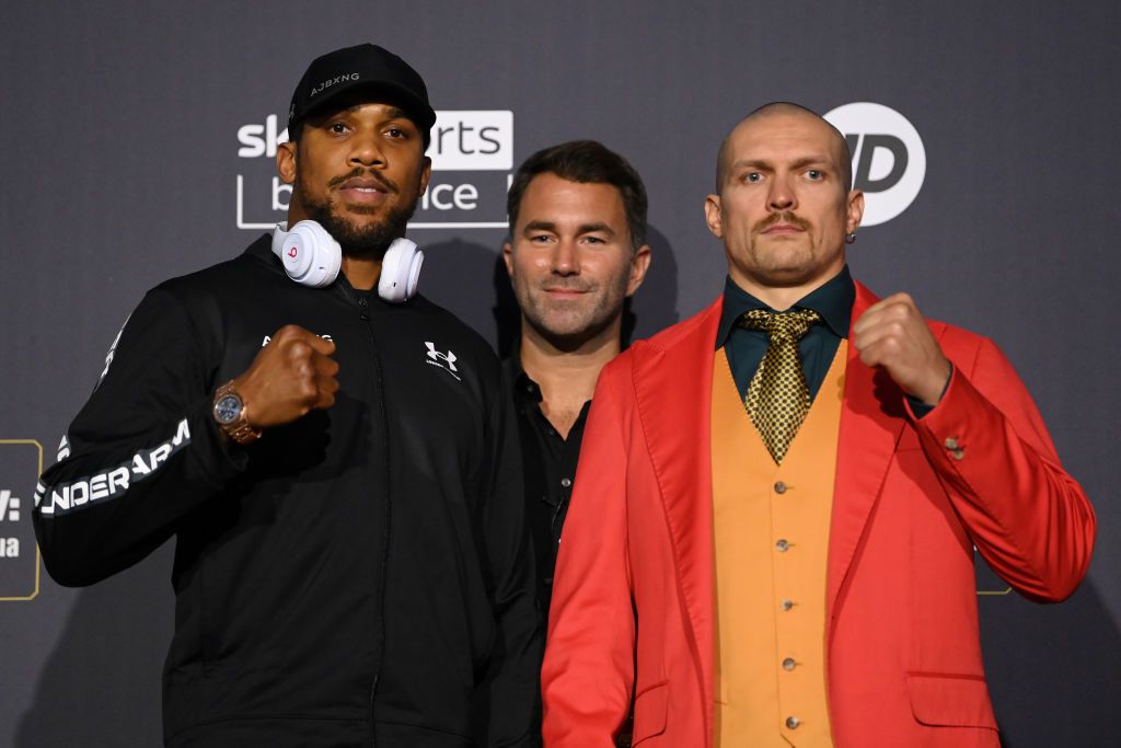 LONDON, ENGLAND - SEPTEMBER 23: Anthony Joshua and Oleksandr Usyk bump fists during a Press Conference ahead of the heavyweight fight between Anthony Joshua and Oleksandr Usyk at Tottenham Hotspur Stadium on September 23, 2021 in London, England. (Photo by Justin Setterfield/Getty Images)