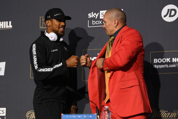 LONDON, ENGLAND - SEPTEMBER 23: Anthony Joshua and Oleksandr Usyk bump fists during a Press Conference ahead of the heavyweight fight between Anthony Joshua and Oleksandr Usyk at Tottenham Hotspur Stadium on September 23, 2021 in London, England. (Photo by Justin Setterfield/Getty Images)
