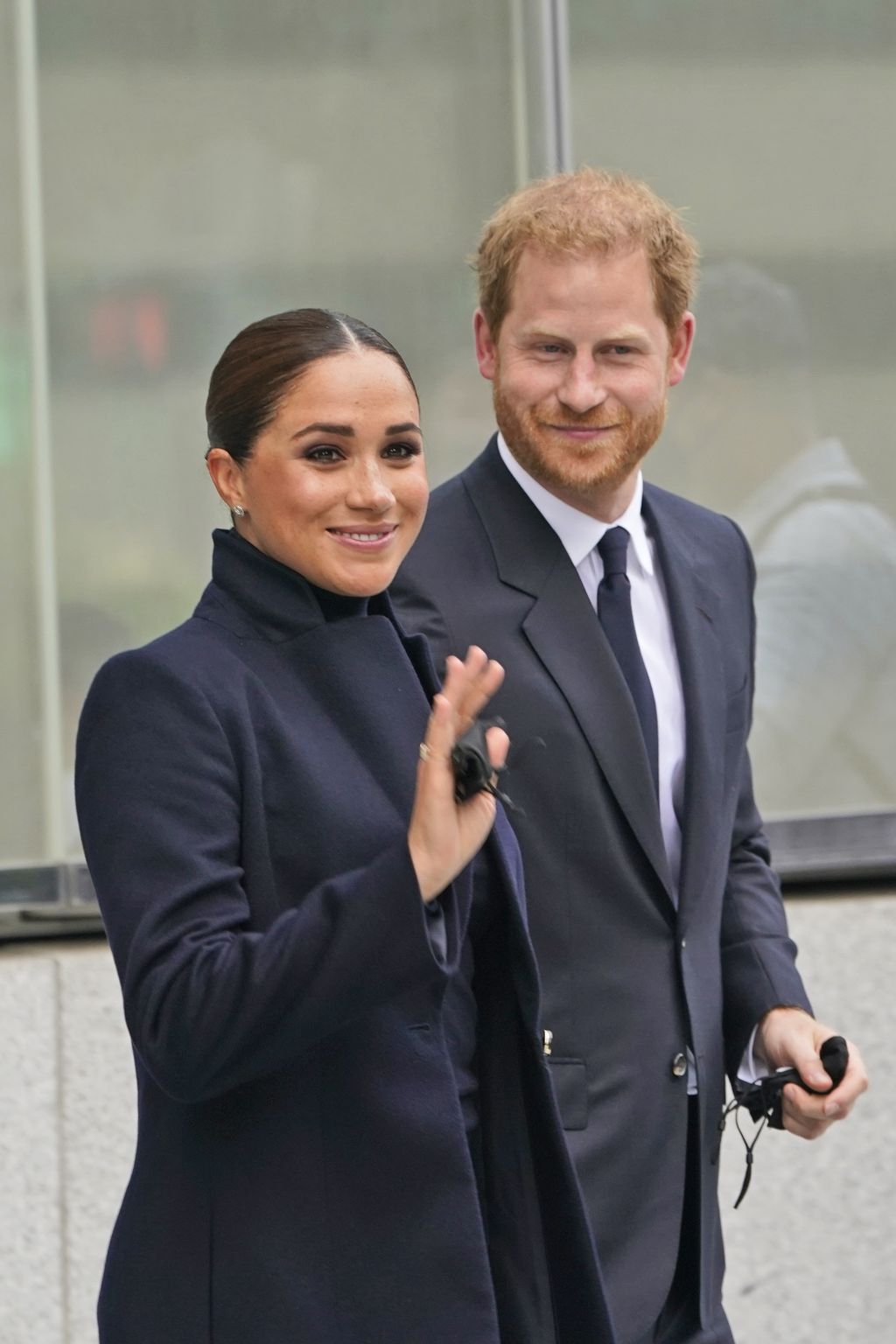 Meghan Markle and Prince Harry pause while getting a tour of the National September 11 Memorial & Museum in New York, Thursday, Sept. 23, 2021. The Duke and Duchess of Sussex got a hawk's-eye view of New York City with a visit to the rebuilt World Trade Center's signature tower. (AP Photo/Seth Wenig)