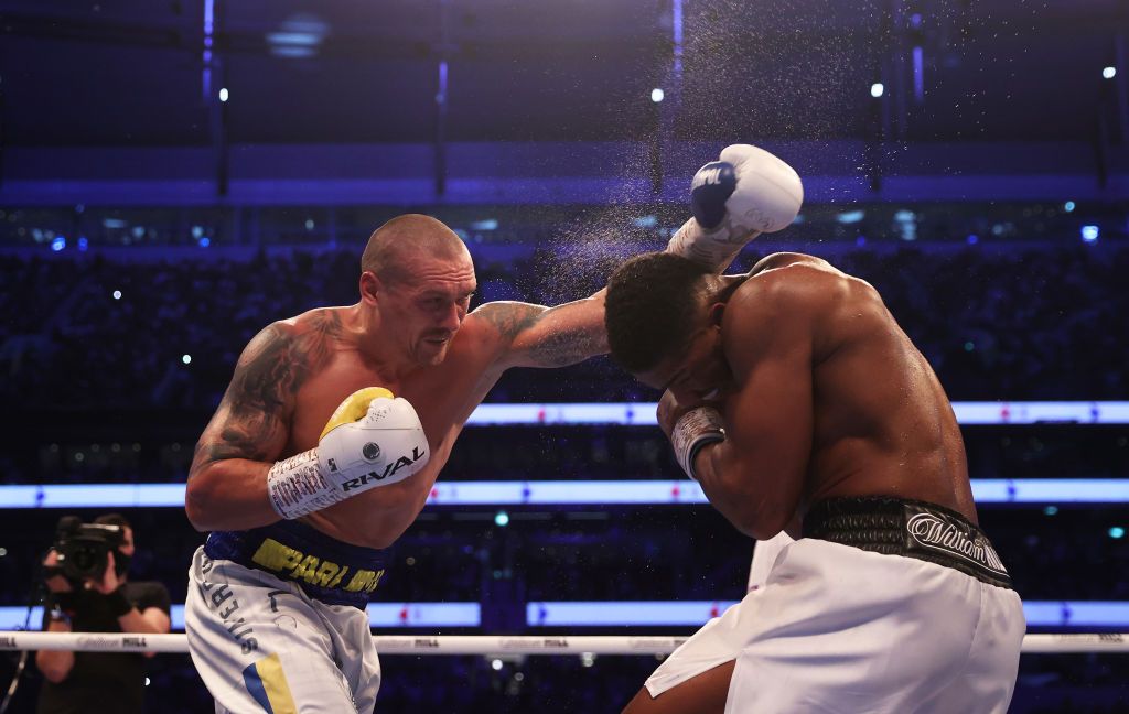 LONDON, ENGLAND - SEPTEMBER 25: Oleksandr Usyk celebrates after being crowned the new World Champion following the Heavyweight Title Fight between Anthony Joshua and Oleksandr Usyk at Tottenham Hotspur Stadium on September 25, 2021 in London, England. (Photo by Julian Finney/Getty Images)