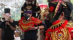 Semringahnya Penari Barongsai Ini Bertemu Sandiaga Uno di Bali