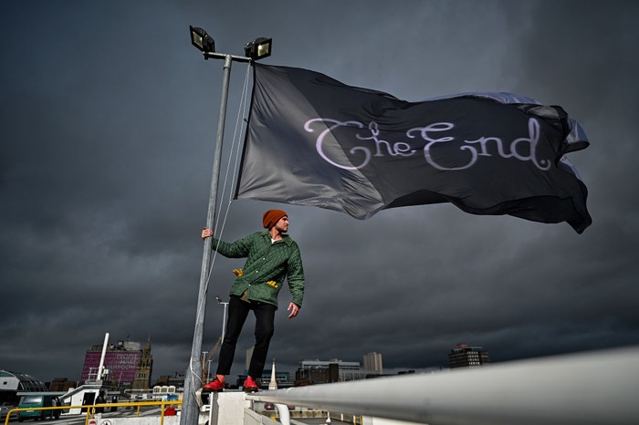 GLASGOW, SCOTLAND - SEPTEMBER 24: Artist Council Baby stands beside her work during the unveiling of an exhibition on top of multi-story carpark on September 24, 2021 in Glasgow, Scotland. The exhibition is called Graduate Drive Thru and features work by 24 artists and designers who graduated from The Glasgow School of Art in 2020. (Photo by Jeff J Mitchell/Getty Images)
