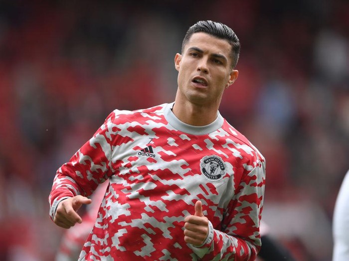 MANCHESTER, ENGLAND - SEPTEMBER 11: Cristiano Ronaldo of Manchester United warms up prior to the Premier League match between Manchester United and Newcastle United at Old Trafford on September 11, 2021 in Manchester, England. (Photo by Laurence Griffiths/Getty Images)