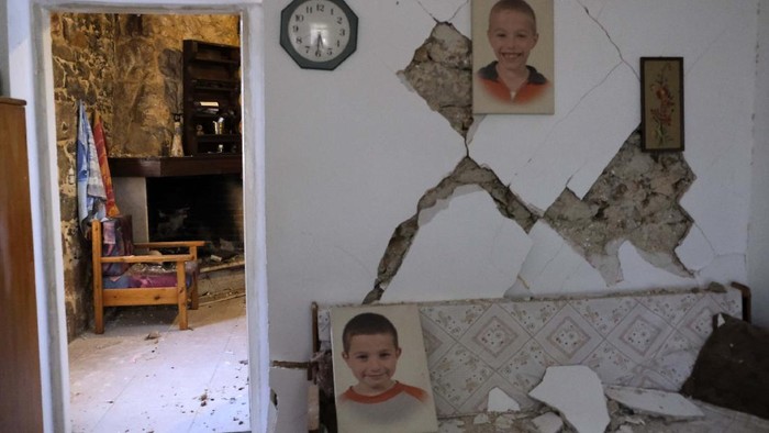 A damaged house is seen after an earthquake in Voni village on the southern island of Crete, Greece, Monday, Sept. 27, 2021. A strong earthquake has struck the Greek island of Crete. One person has been killed and 20 have been injured. Homes and churches were damaged and rock slides occurred near the country's fourth-largest city. (AP Photo/Harry Nakos)
