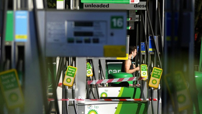 Petrol pumps out of use at a petrol station in London, Wednesday, Sept. 29, 2021. Prime Minister Boris Johnson sought to reassure the British public Tuesday that a fuel-supply crisis snarling the country was “stabilizing,” though his government said it would be a while before the situation returns to normal. Johnson's government has put army troops on standby to help distribute gasoline and help ease a fuel drought, triggered by a shortage of truck drivers, that has drained hundreds of pumps and sent frustrated drivers on long searches for gas. (AP Photo/Frank Augstein)