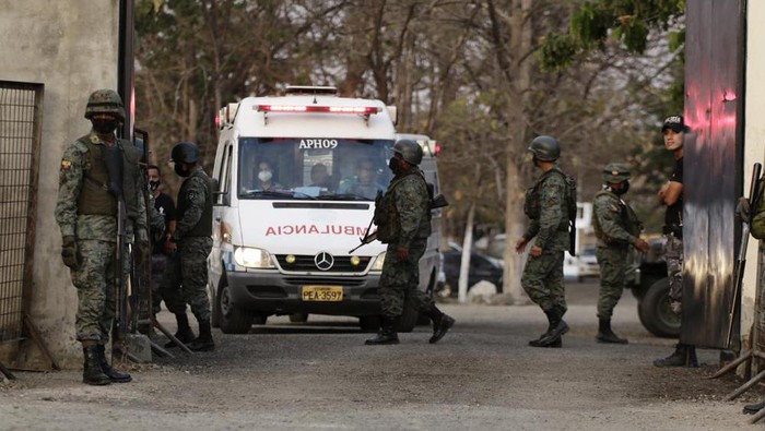 An ambulance leaves the Litoral Penitentiary after a prison riot, in Guayaquil, Ecuador, Wednesday, September 29, 2021. Authorities report at least 100 dead and 52 injured during the riot on Tuesday at the prison. (AP Photo/Angel DeJesus)