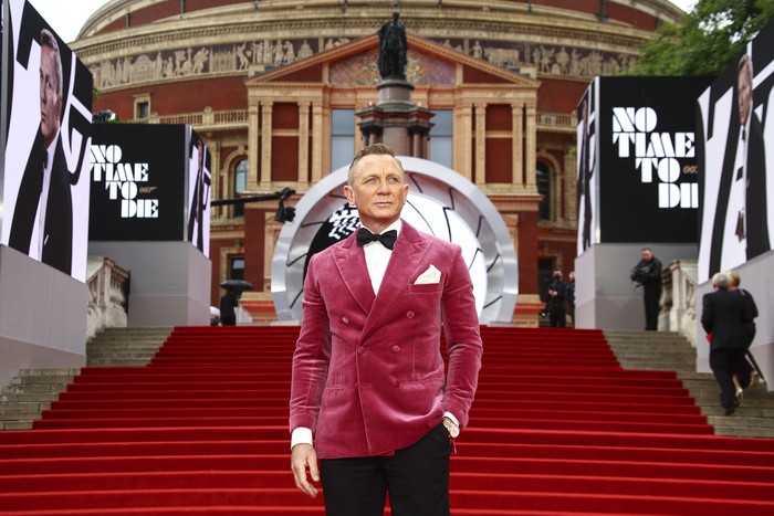 Daniel Craig poses for photographers upon arrival for the World premiere of the new film from the James Bond franchise No Time To Die, in London Tuesday, Sept. 28, 2021. (Photo by Joel C Ryan/Invision/AP)