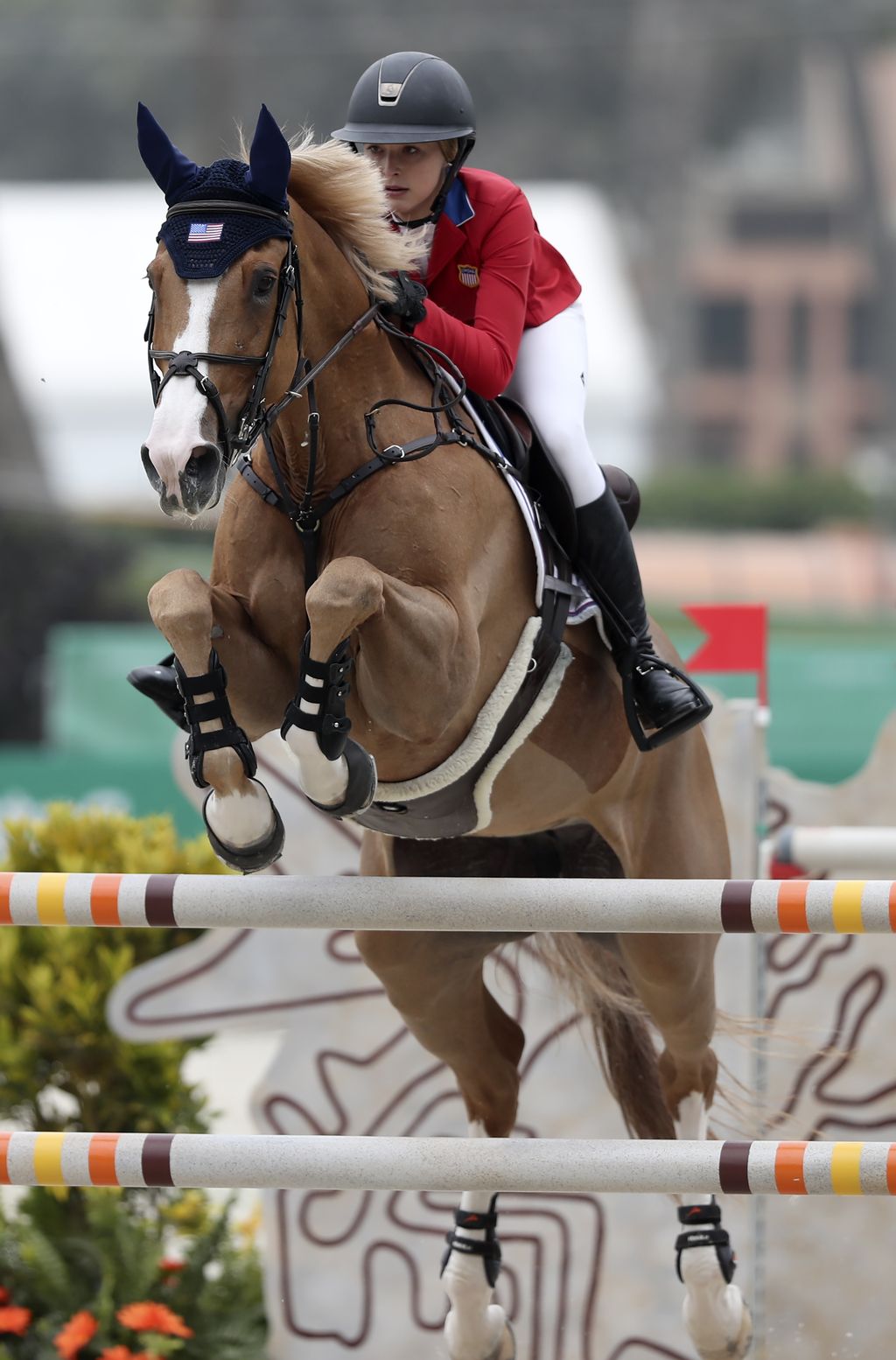 LIMA, PERU - AUGUST 07: Eve Jobs of United States riding Venue D'Fees Des Hazalles competes during equestrian Jumping Team at Army Equestrian School on Day 12 of Lima 2019 Pan American Games on August 7, 2019 in Lima, Peru. (Photo by Raul Sifuentes/Getty Images for FEI)