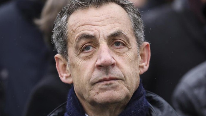 FILE - In this Monday Nov. 11, 2019 file photo, French former president Nicolas Sarkozy attends a ceremony at the Arc de Triomphe in Paris. Sarkozy is facing potential prison term in a verdict to be rendered on Thursday, Sept. 30, 2021 about campaign financing in his unsuccessful 2012 re-election bid. Sarkozy, France’s president from 2007 to 2012, has vigorously denied wrongdoing during the May-June trial. (Ludovic Marin/Pool via AP, file)