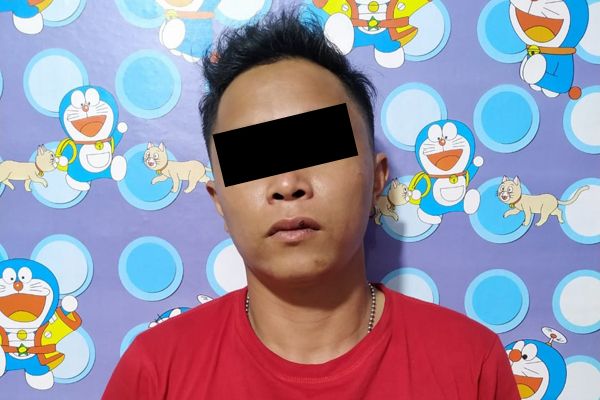 Pria berinisial RS (32) ditangkap Polres Minahasa atas dugaan KDRT ke istrinya yang videonya viral (dok Polda Sulut)