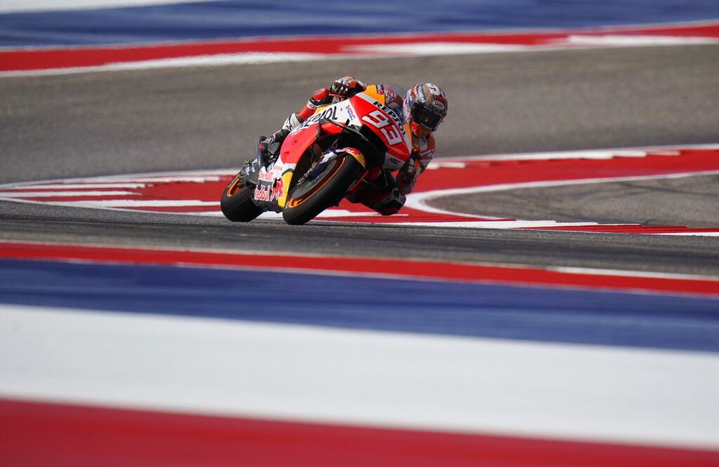 Marc Marquez (93), of Spain, steers through a turn during an open practice session for the MotoGP Grand Prix of the Americas motorcycle race at the Circuit of the Americas, Friday, Oct. 1, 2021, in Austin, Texas. (AP Photo/Eric Gay)