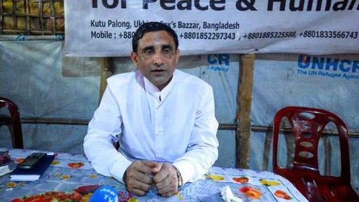 In this photo taken on July 24, 2019, Rohingya community leader Mohib Ullah poses for a photo during an interview with AFP in Kutupalong refugee camp in Ukhia. - When hundreds of thousands of Rohingya fled Myanmar into Bangladesh two years ago, local communities were mostly welcoming. Today that welcome has worn thin, and resentment, anger and fear are creeping in. (Photo by Munir UZ ZAMAN / AFP) / To go with story BANGLADESH-MYANMAR-REFUGEE-ROHINGYA-UNREST, FOCUS by Sam Jahan