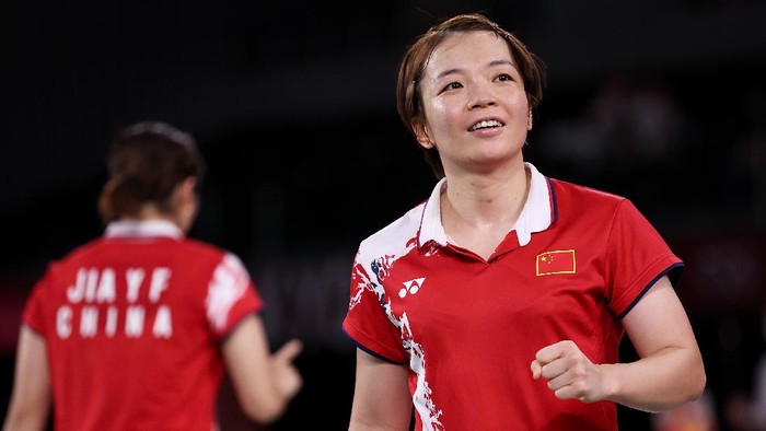 CHOFU, JAPAN - AUGUST 02: Chen Qing Chen and Jia Yi Fan(left) of Team China react as they compete against Greysia Polii and Apriyani Rahayu of Team Indonesia during the Women’s Doubles Gold Medal match on day ten of the Tokyo 2020 Olympic Games at Musashino Forest Sport Plaza on August 02, 2021 in Chofu, Tokyo, Japan. (Photo by Lintao Zhang/Getty Images)