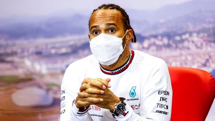 SOCHI, RUSSIA - SEPTEMBER 26: Race winner Lewis Hamilton of Great Britain and Mercedes GP talks in the press conference after the F1 Grand Prix of Russia at Sochi Autodrom on September 26, 2021 in Sochi, Russia. (Photo by Andy Hone - Pool/Getty Images)