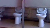 Duh pintu toilet ini lebih tinggi dari closetnya. Orang yang lagi buang air bisa tetap terlihat.