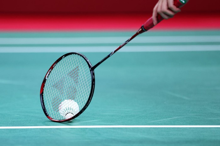 TOKYO, JAPAN - SEPTEMBER 04: Ayako Suzuki of Team Japan picks up a shuttle with her racket during the Badminton Womens Singles SU5 semi-final against Kaede Kameyama of Team Japan on day 11 of the Tokyo 2020 Paralympic Games at Yoyogi National Stadium on September 04, 2021 in Tokyo, Japan. (Photo by Kiyoshi Ota/Getty Images)