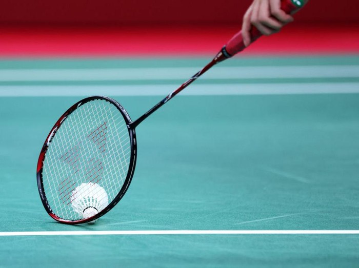 TOKYO, JAPAN - SEPTEMBER 04: Ayako Suzuki of Team Japan picks up a shuttle with her racket during the Badminton Womens Singles SU5 semi-final against Kaede Kameyama of Team Japan on day 11 of the Tokyo 2020 Paralympic Games at Yoyogi National Stadium on September 04, 2021 in Tokyo, Japan. (Photo by Kiyoshi Ota/Getty Images)