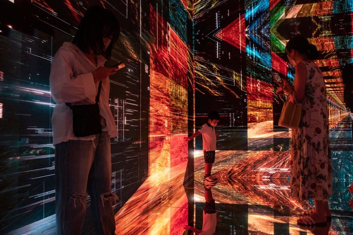 HONG KONG, CHINA - OCTOBER 04: Visitors experience an immersive art installation titled 
